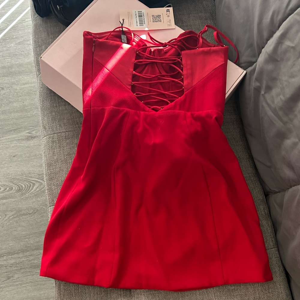 Red dress with heart in front.
